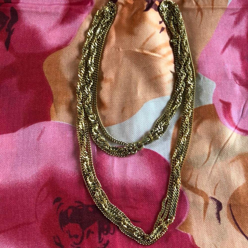 Gold tone triple strand long costume necklace